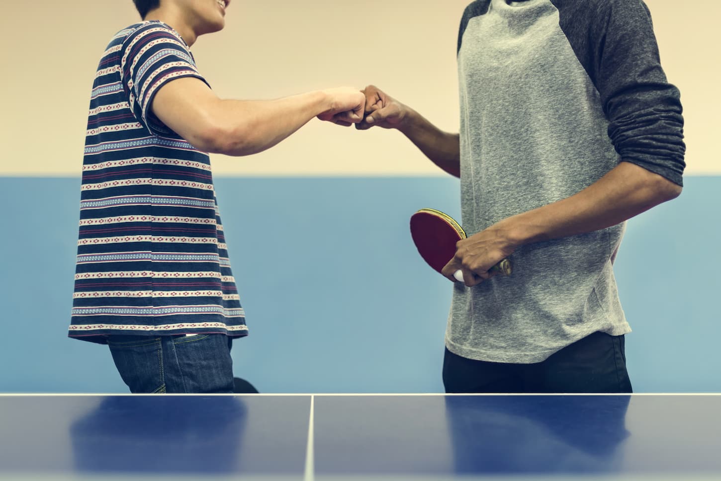 An image of two table tennis players in a game practice. Sports concept.