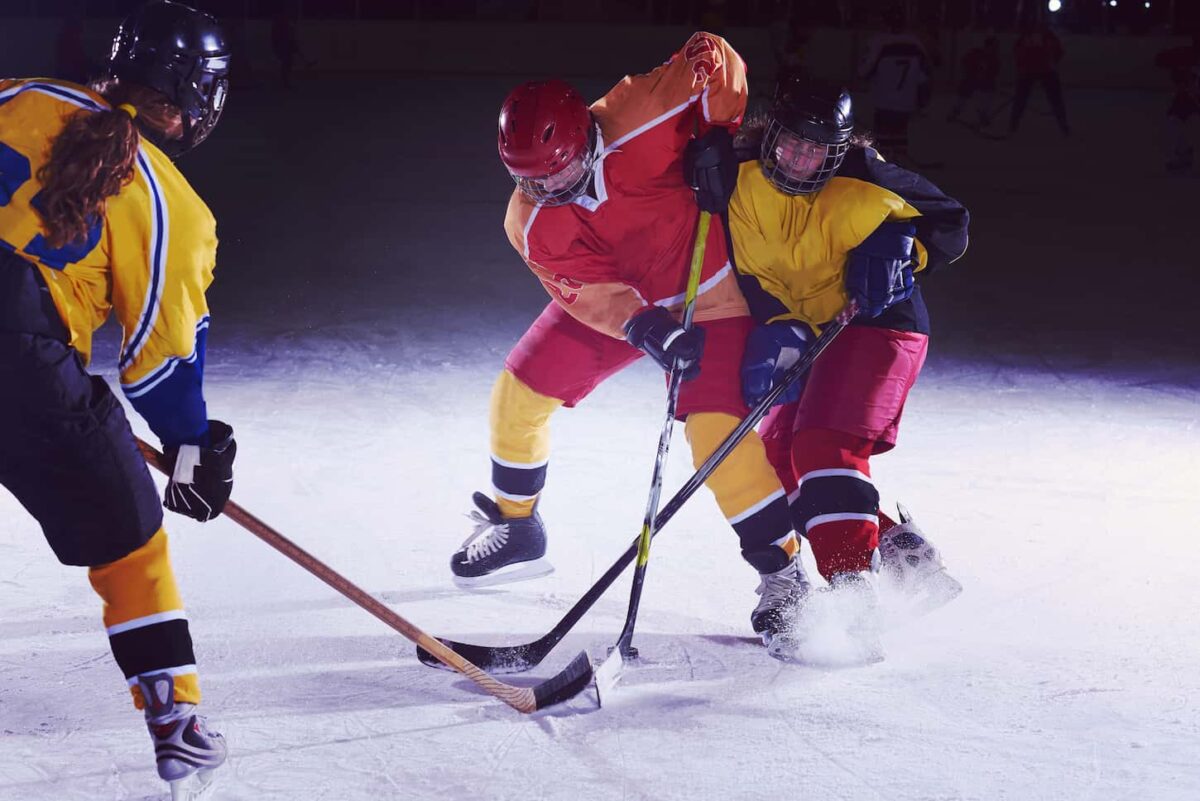 An image of ice hockey sports players in action.